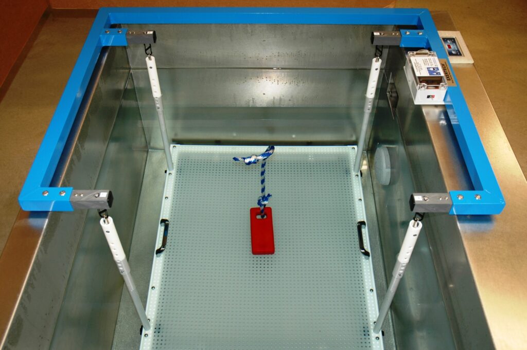 Four load cell weighing system on shallow tank.