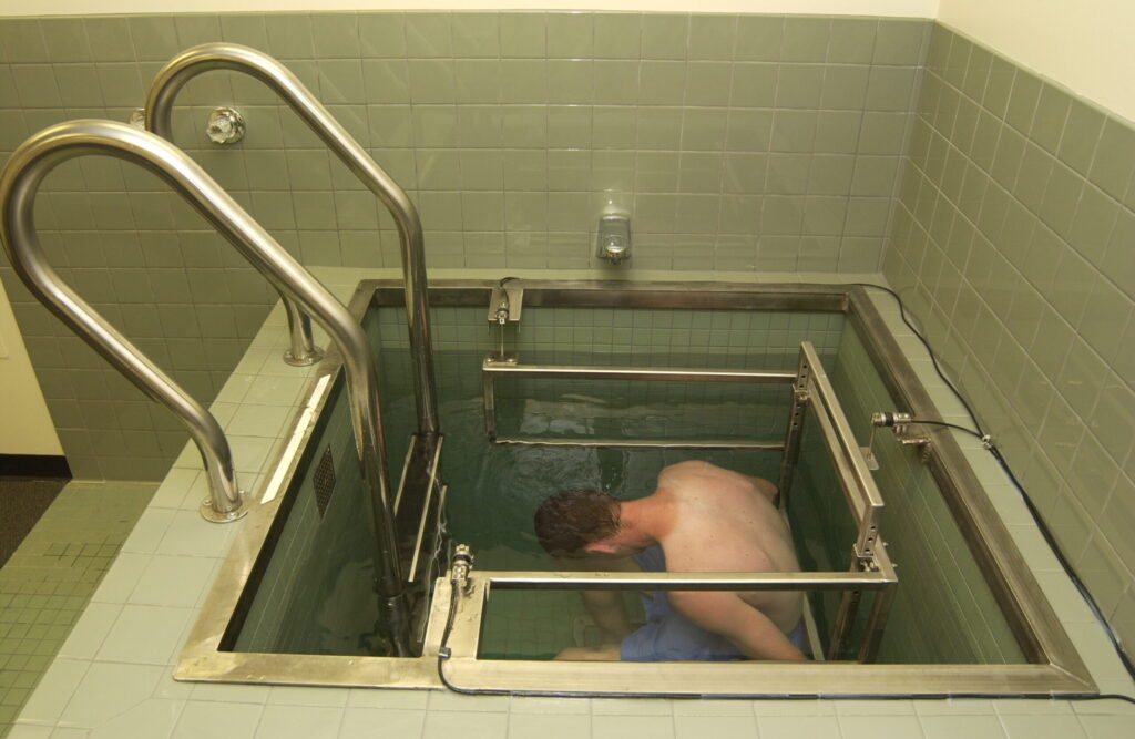 Three load cell system on tiled concrete tank.